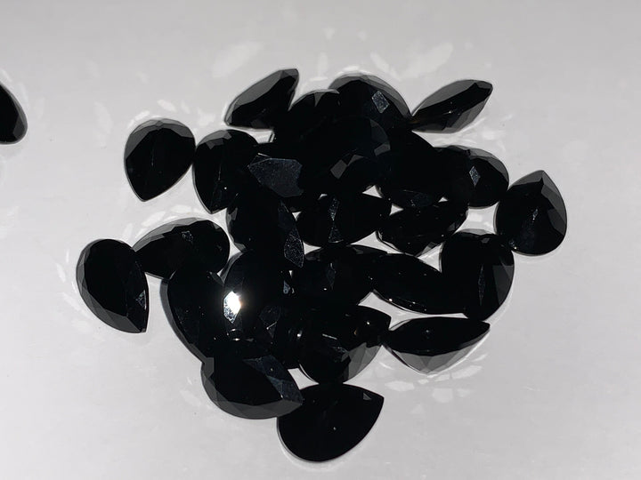 Faceted Black Onyx - Mixed Sizes (10 Carat Lot)