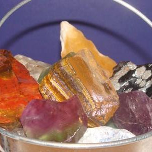 Metal Bucket Full of Rocks and Gemstones